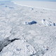 The western edge of the famed iceberg A-68 (TOP R), calved from the Larsen C ice shelf, is seen from NASA’s Operation IceBridge research aircraft, near the coast of the Antarctic Peninsula region, on October 31, 2017, above Antarctica.
